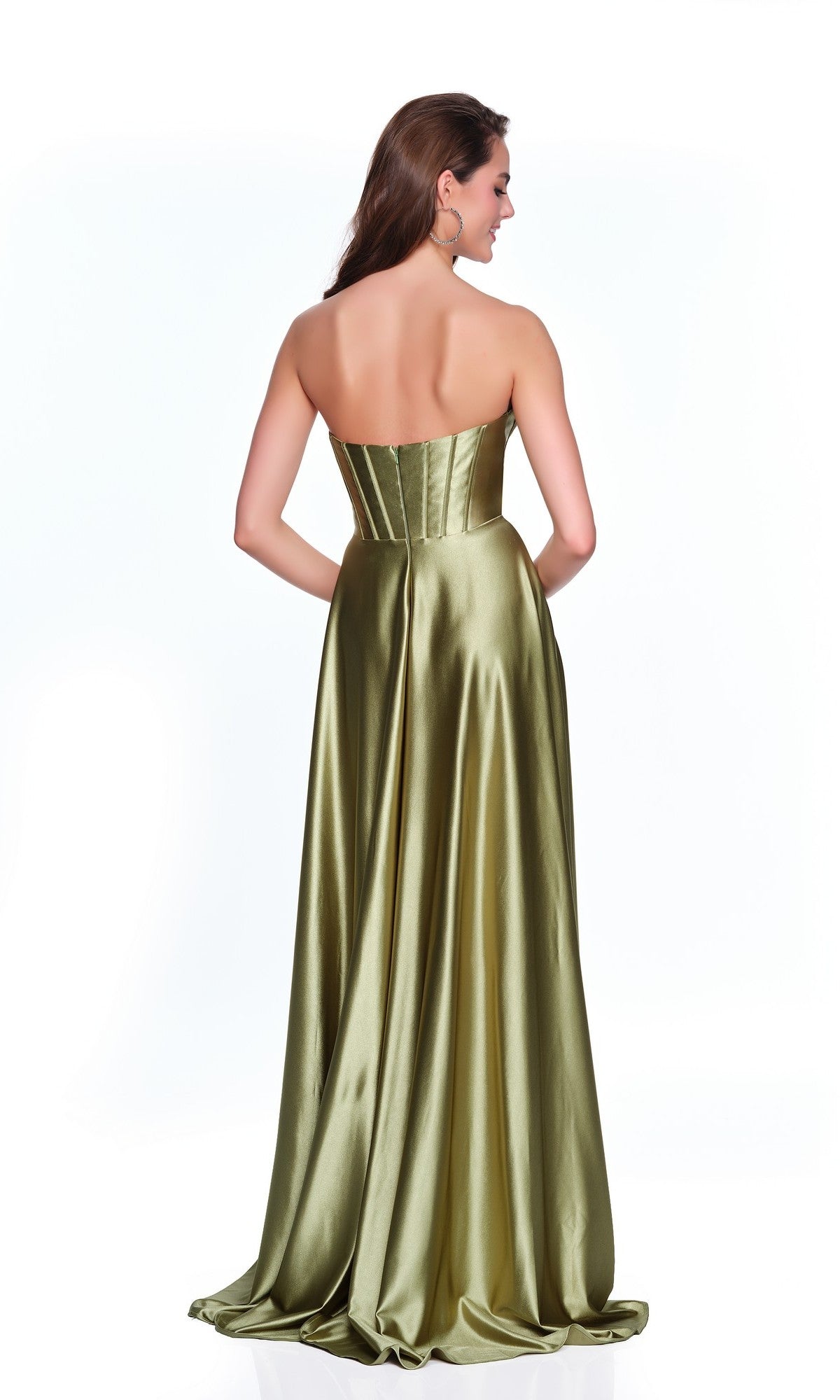 A woman showcases the elegant back of the Dave and Johnny 12717 long prom dress, a strapless floor-length olive green satin gown, as she stands facing away against a white background.